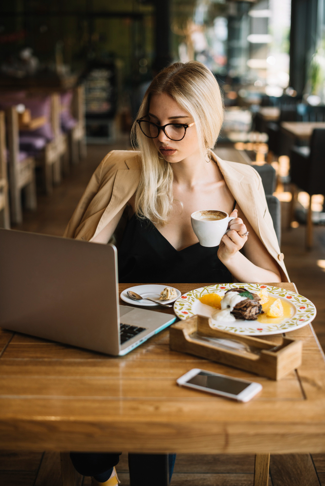 freepik.com:free-photo:attractive-young-woman-working-laptop-holding-coffee-cup_2698247.htm#&position=0&from_view=search&track=ais&uuid=9c43c448-960a-4f92-a696-c16a1d2db392